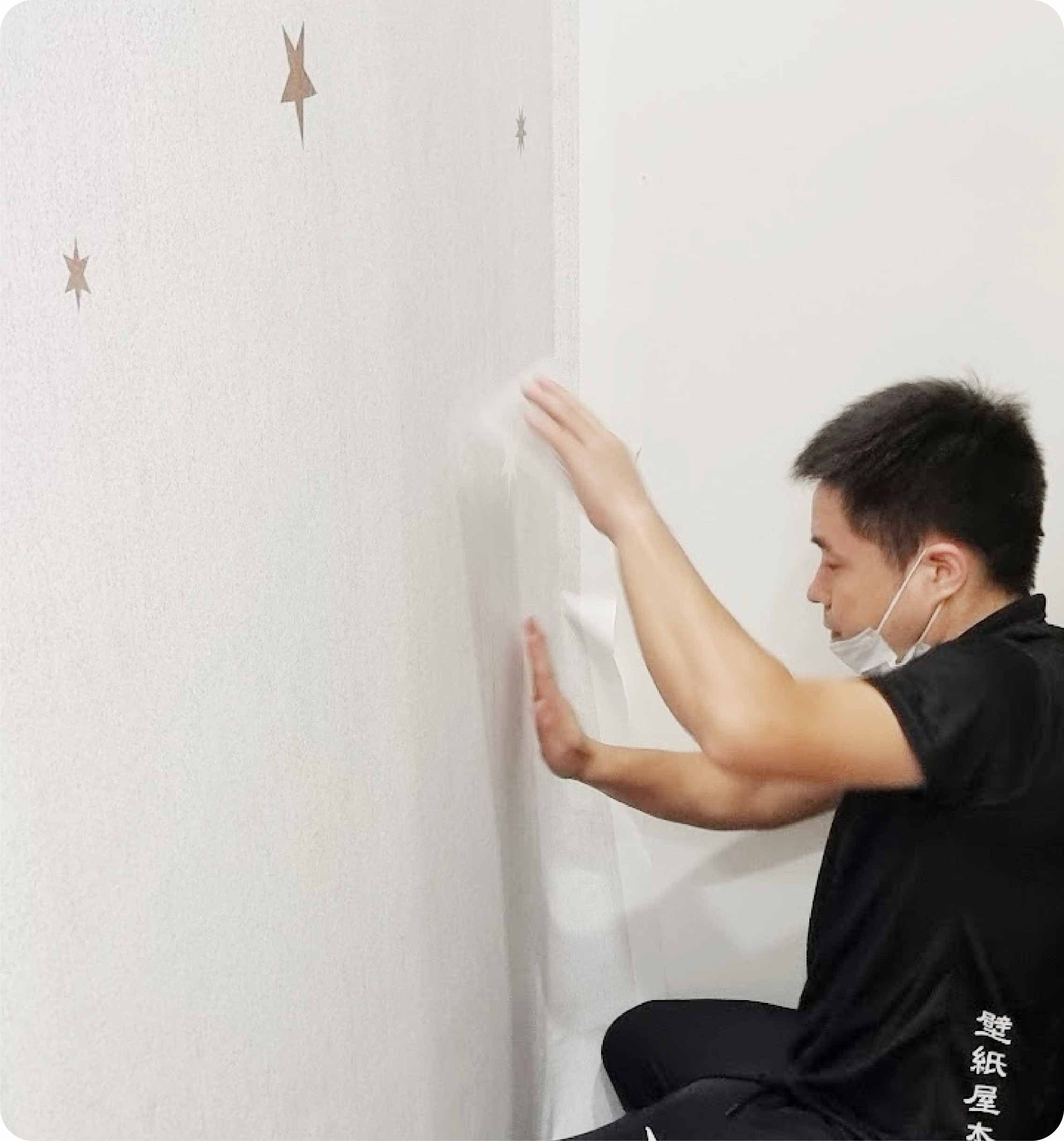 Honpo installer applying wallpaper in a child's room
